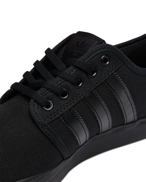 adidas black herren|adidas black sneakers.